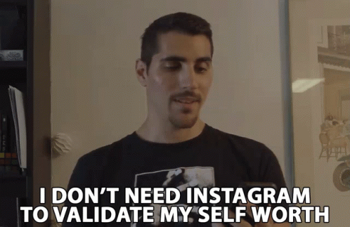 a man in a black shirt has an instagram message on it