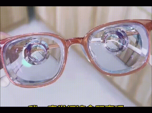 glasses on display with the reflection of the eye