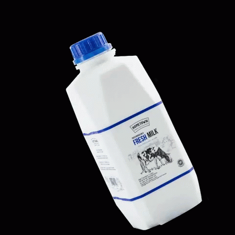 milk in the dark with a sticker of the label on the bottom