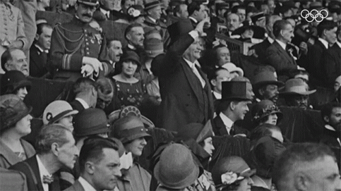 a crowd of people are shown in an old po