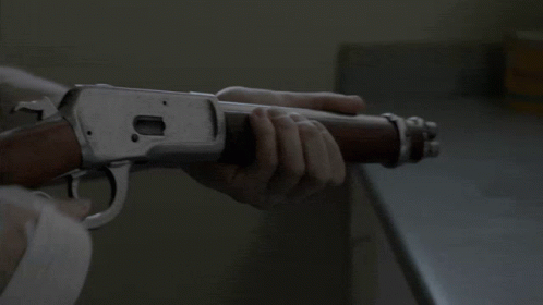 a sci - fit gun strapped to a shelf in a room
