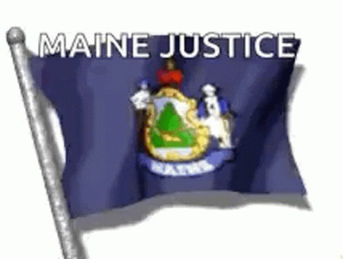 a large flag that is next to the words maine justice