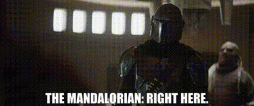 star wars characters standing in front of a screen with caption stating, the mandalrian right here is your name
