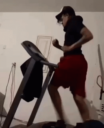 a person standing at the top of a treadmill