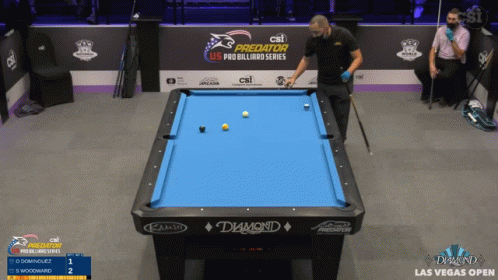 two men playing a game of pool