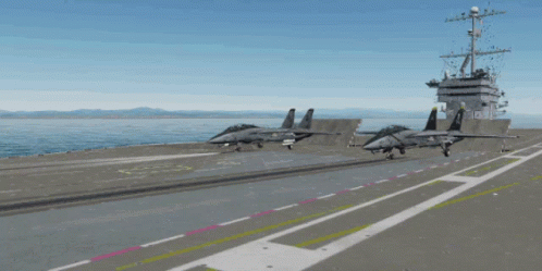 an aircraft carrier on the runway with three jets