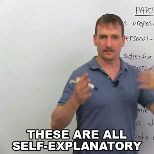 a man is standing and gesturing in front of whiteboard with words about self - exlane