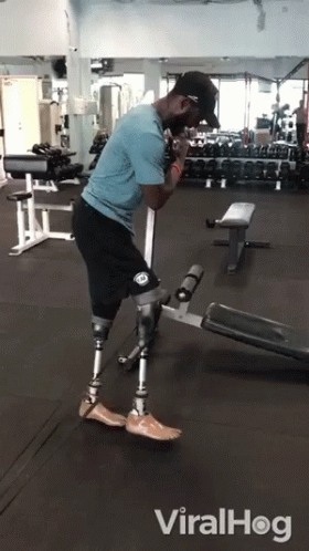 man wearing a leg ce in a gym