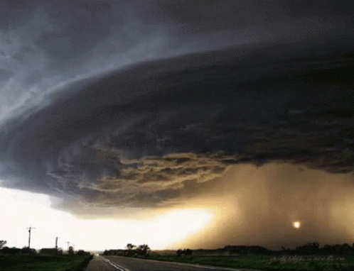 a large storm moves across a rural area