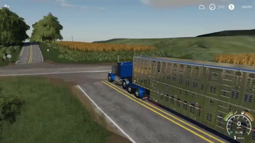 a large truck driving down a curvy road