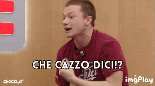 a guy holding a tennis racket with an image of the word che cazzo dici in front of him