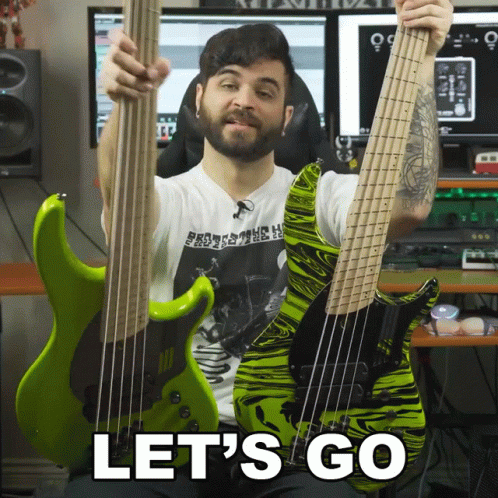 a guy holding two basses with the text let's go to the radio