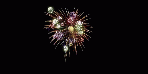 a brightly colored fireworks is shown on a dark background