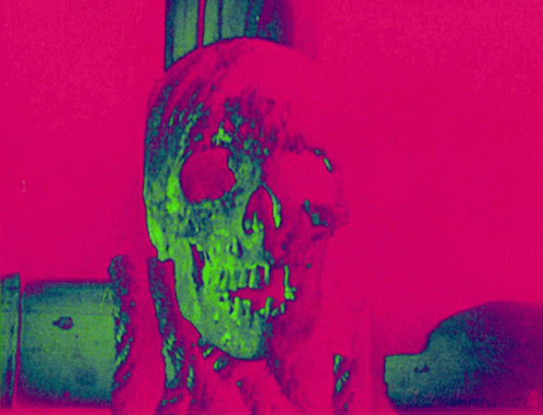 a human skull wearing a tie and a blue background