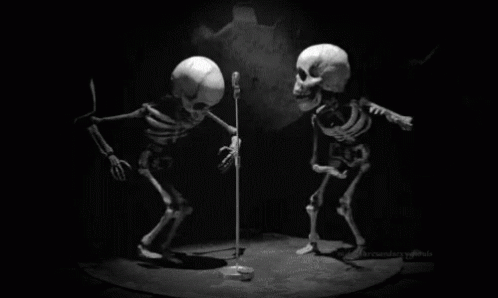 a pair of skeletons dance together with poles in their hands