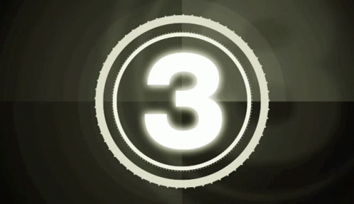 a circular logo with the number three on it