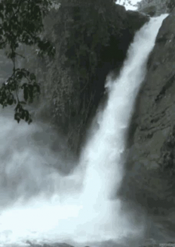 there is water falling down the side of the falls