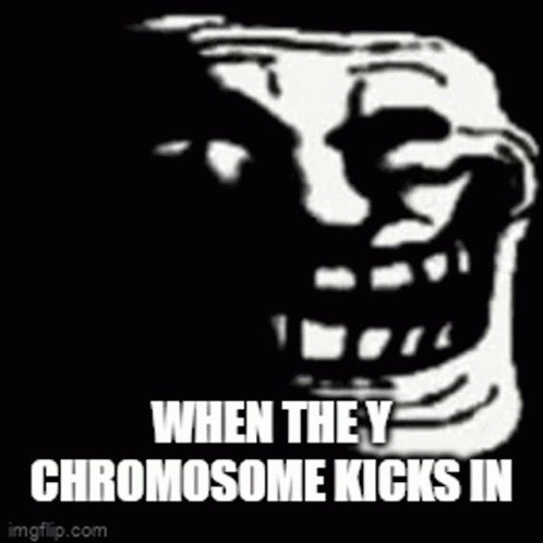 an image of a creepy face with caption when they're chromsome kicks in