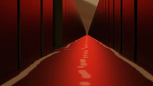an image of a long corridor with light coming in