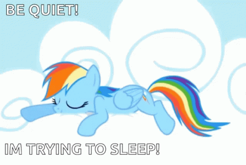the image shows a cute pony laying down