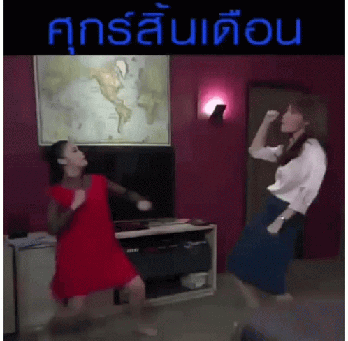 a woman standing up and dancing in a living room