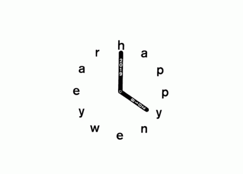 a small clock with the word happy on it