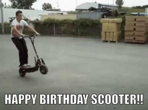 a man with a happy birthday message riding a scooter