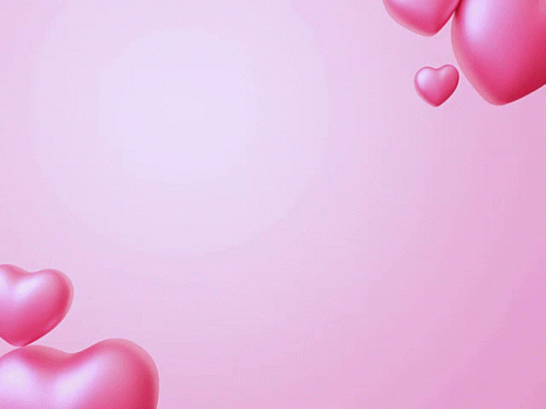 a pink wallpaper with some hearts hanging out of it