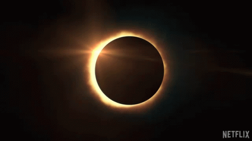 a solar eclipse eclipse is seen over a black background