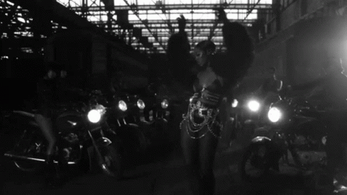 women riding bikes in the dark at night