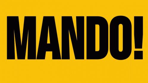 the text is surrounded by black letters that spell mando
