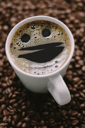a coffee mug has been painted like a face