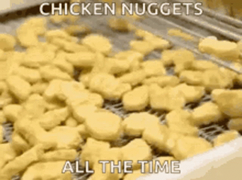 blue nuggets in an aluminum bin that says chicken nuggets all the time