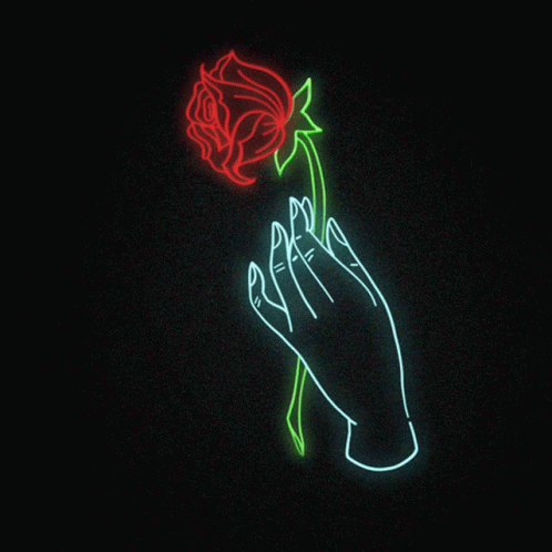 hand holding a flower that has been created by neon