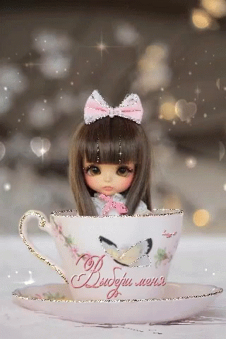 an animated picture of a teacup and doll
