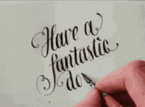 a hand writing with a pen, with the words'have a fantastic day'in black letters on white paper