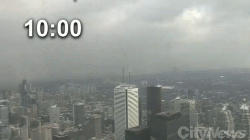 an air plane is taking off over a city