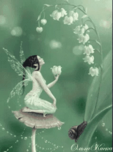 a fairy tinker sitting on top of a flower