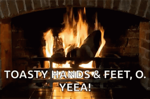 a fireplace with the words toasty hands & feet, o yea