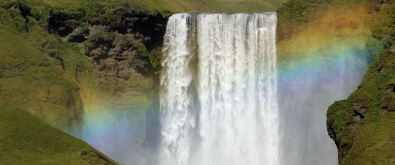 the rainbows light up the water and create this image