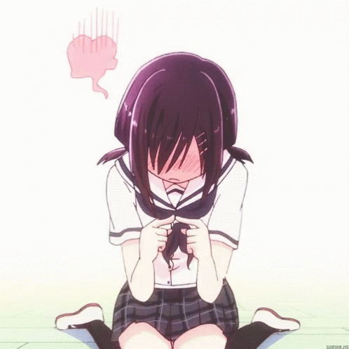 a girl sitting down in a sad - looking room