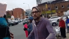 a blurry image of an person on the street