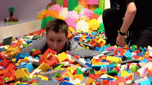 there is a baby that is playing with colorful legos