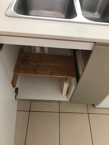 the stainless steel kitchen sink was left open