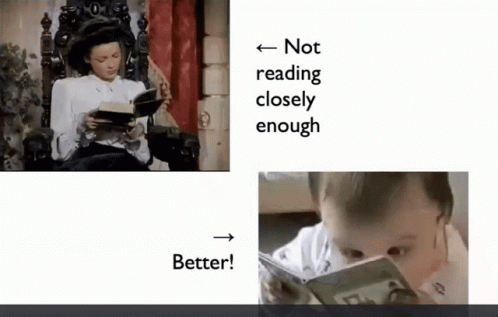 a baby reading while another reads a book