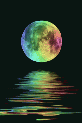 the moon is reflected in the water with no clouds