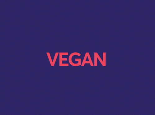 the word vegan is displayed on an orange and purple background