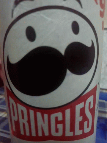 a cup with the words pringles printed on it