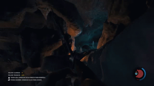 a cave with large rocks and a cave with water