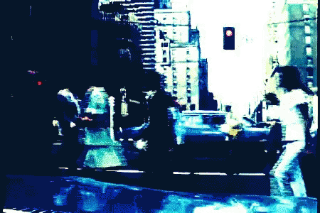 a blurry pograph of people walking around in the city